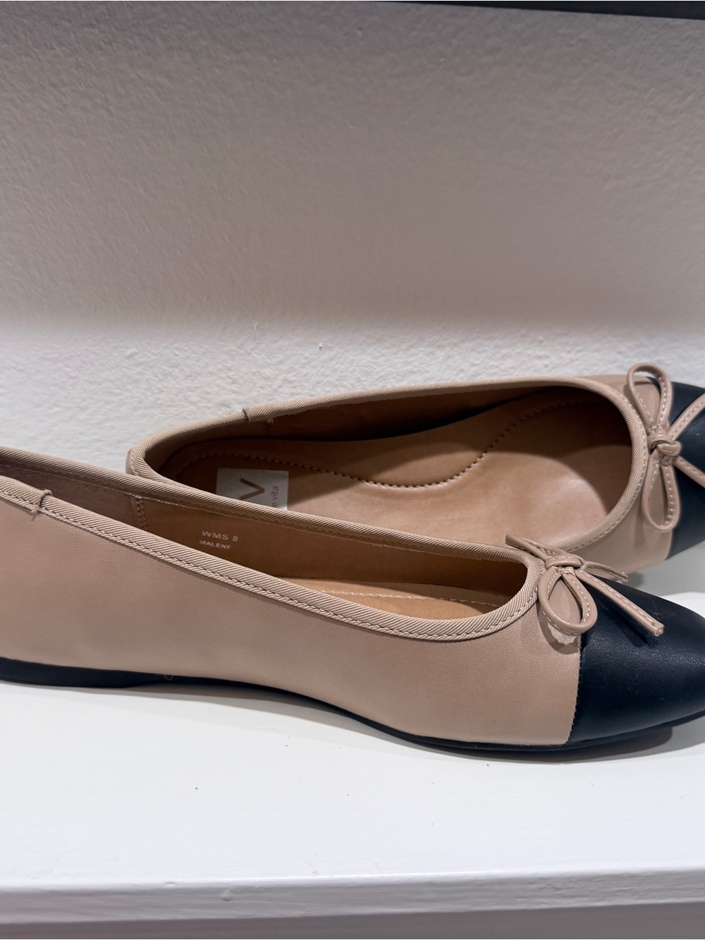 Dolce Vita Beige and Black Cap-Toe Ballet Flats with Bow